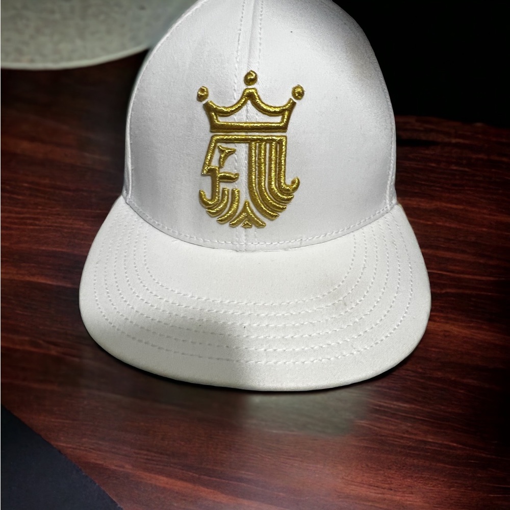 Brine hat gold king logo
